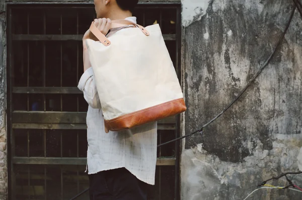 Man with canvas bag — Stock Photo, Image