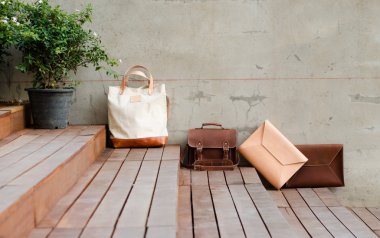 Fashion Leather Bags on grunge background