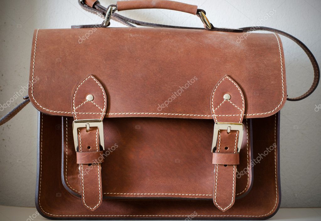 Brown Vintage leather briefcase Stock Photo by ©siraanamwong 40992261