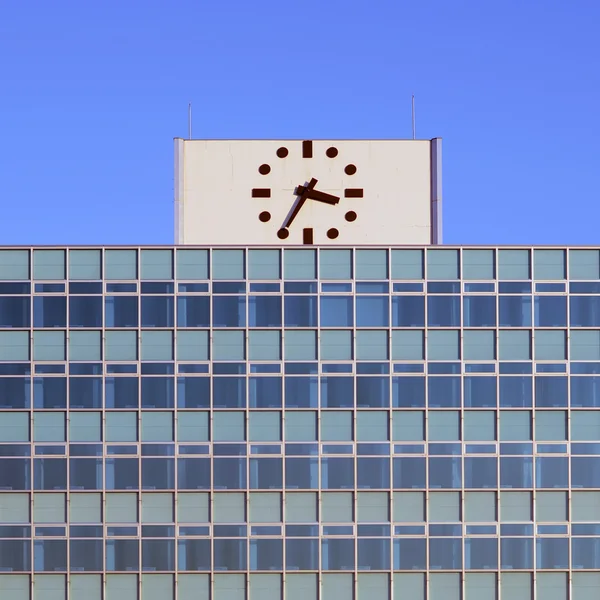 Clock on the top of building — Stock Photo, Image