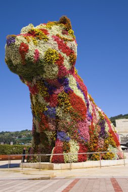Giant floral dog 'Puppy', by Jeff Koons, at the entrance of the clipart