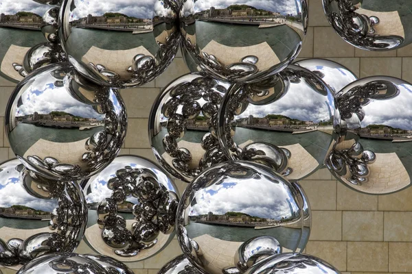 Stainless steel balls cityscape reflection — Stock Photo, Image