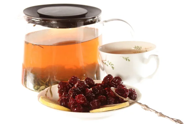 Tea with cherry jam and lemon isolated — Stock Photo, Image
