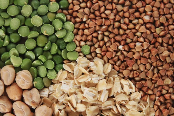 Buckwheat oatmeal grains background — Stock Photo, Image