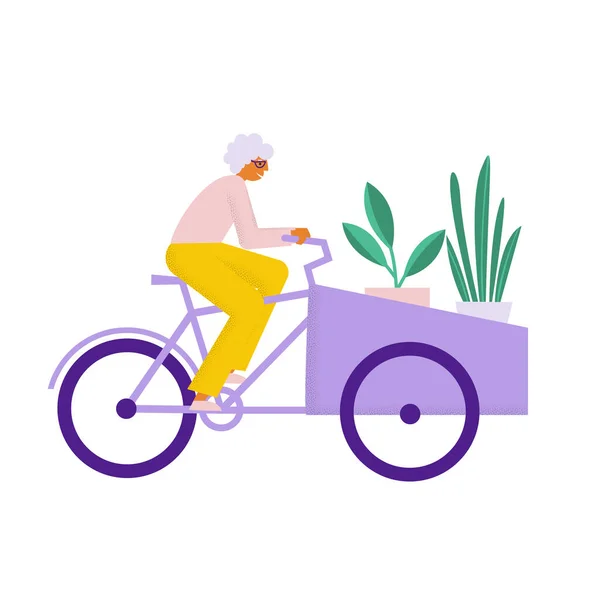 Starsza kobieta jeździ na rowerze towarowym z roślinami. Babcia transportuje swój personel na rowerze piekarskim — Wektor stockowy