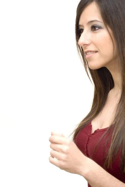 Retrato de una joven hermosa mujer con camisa roja sobre fondo blanco — Foto de Stock