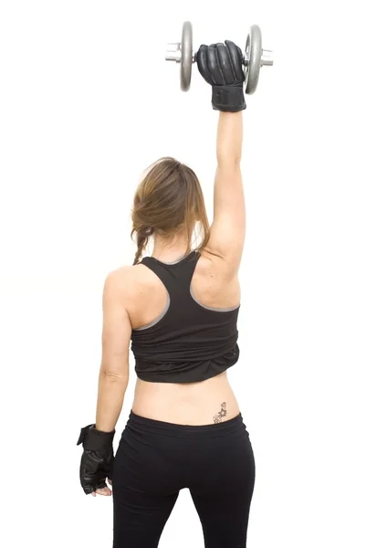 Beautiful woman lifting dumbbell — Stock Photo, Image