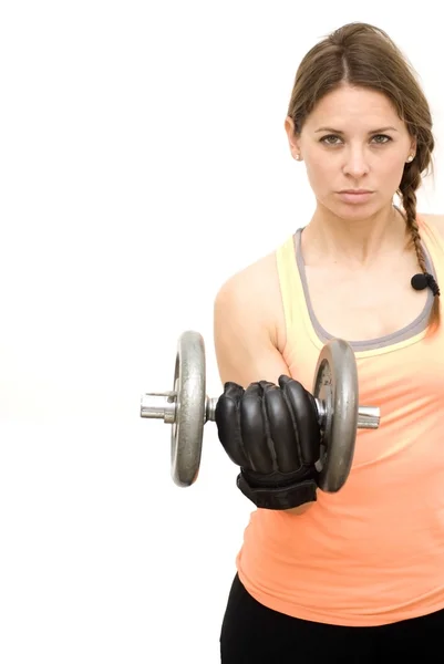 Beautiful woman lifting dumbbell — Stock Photo, Image