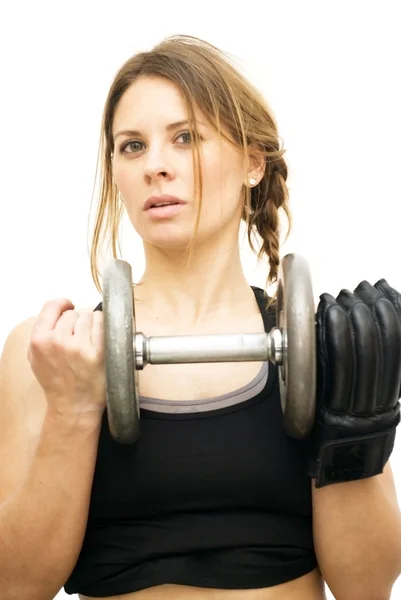 Beautiful woman lifting dumbbell — Stock Photo, Image