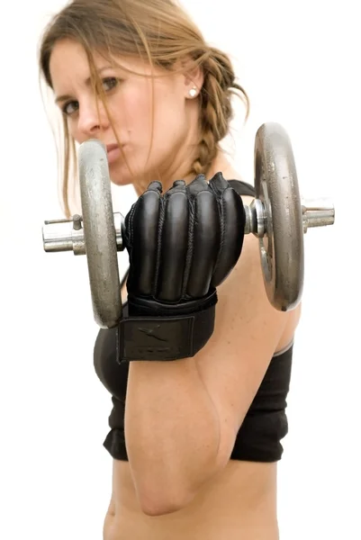 Beautiful woman lifting dumbbell — Stock Photo, Image