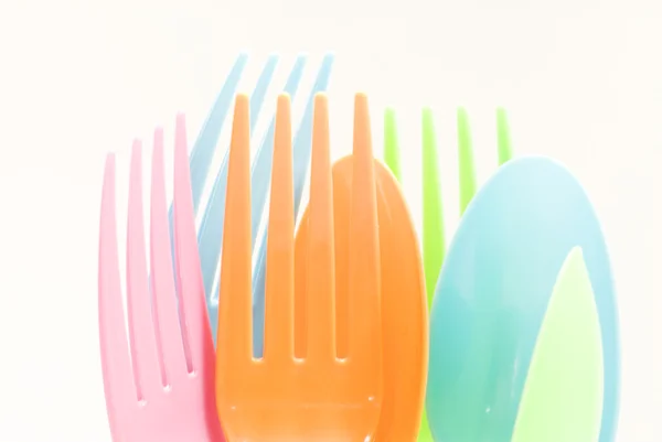 Plastic tableware consisting of spoon and fork — Stock Photo, Image