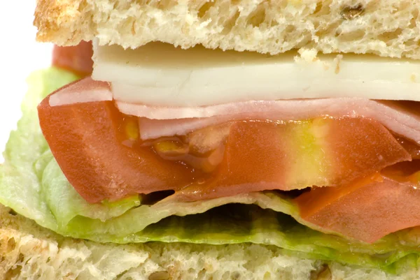 Smörgås med ost, skinka, tomat och sallad — Stockfoto