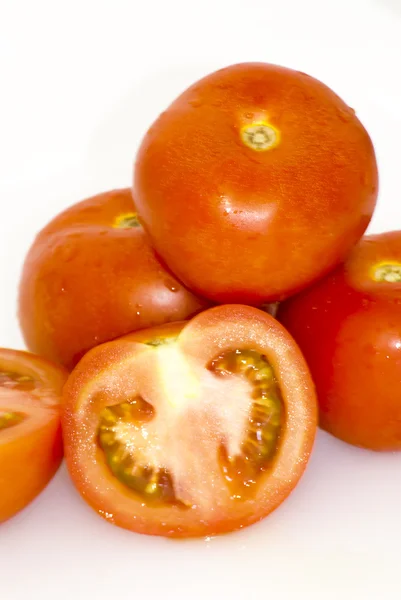 Tomates isolados em branco — Fotografia de Stock