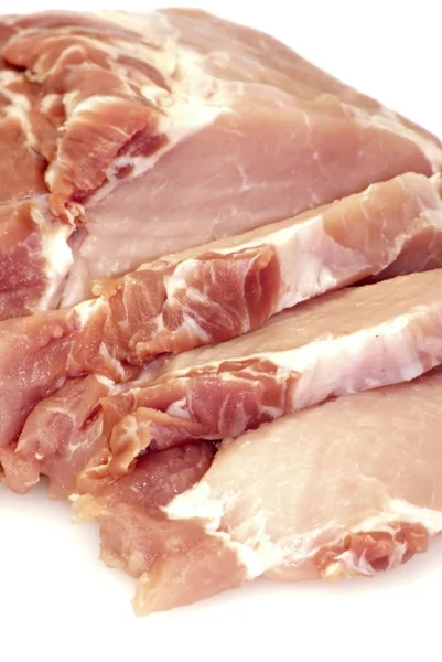 Stück rohes Fleisch in Steaks geschnitten — Stockfoto