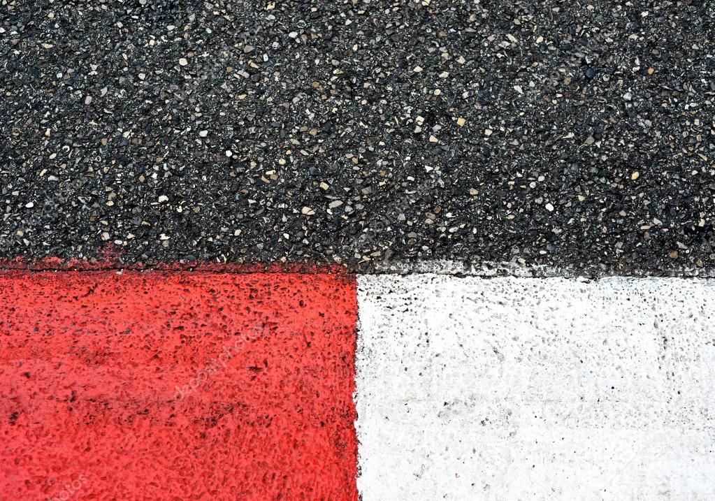 Texture of race asphalt and curb on Grand Prix circuit