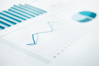iş verileri rapor ve grafik baskı. seçici odak. tonda mavi