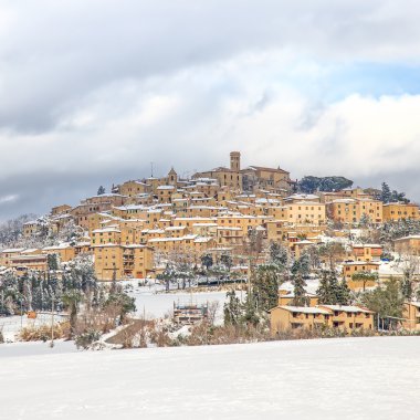 Tuscany, Casale Marittimo village covered by snow in winter. Italy clipart