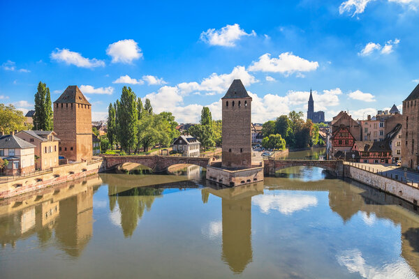 Strasbourg, medieval bridge Ponts Couverts and Cathedral. Alsace, France.