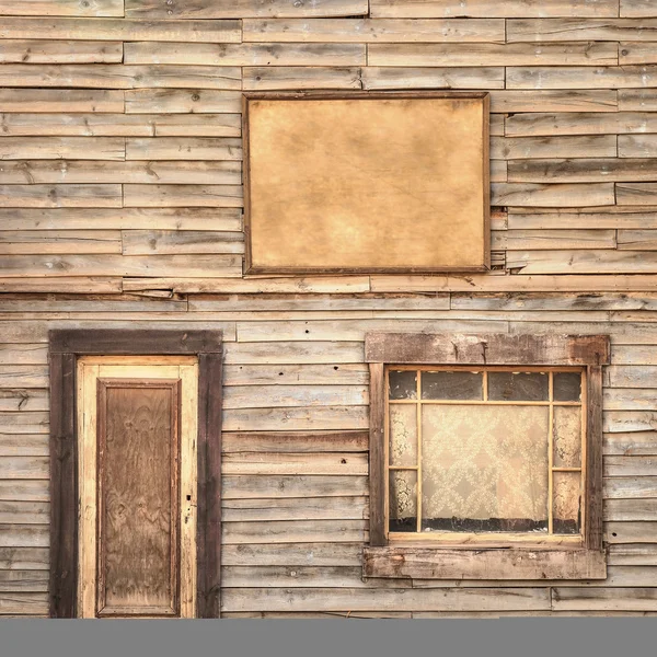 Zachodniej fasady drewniane sztuka tło. drzwi, okna i deska — Zdjęcie stockowe