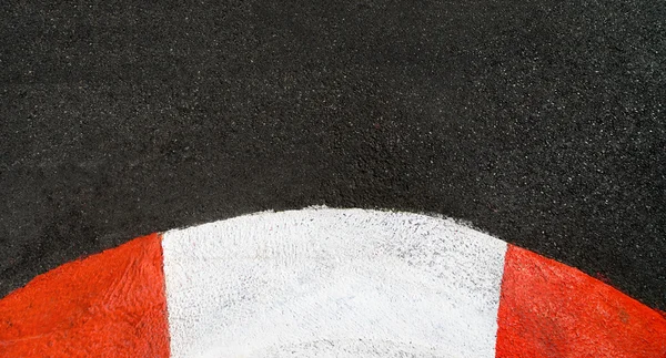 Texture of race asphalt and curved curb Grand Prix circuit — Stock Photo, Image