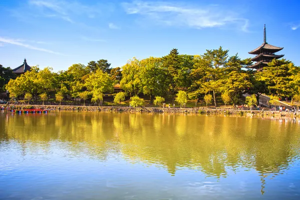 Park, pond and Toji temple pagoda in Nara city. Japan. — Stock Photo, Image