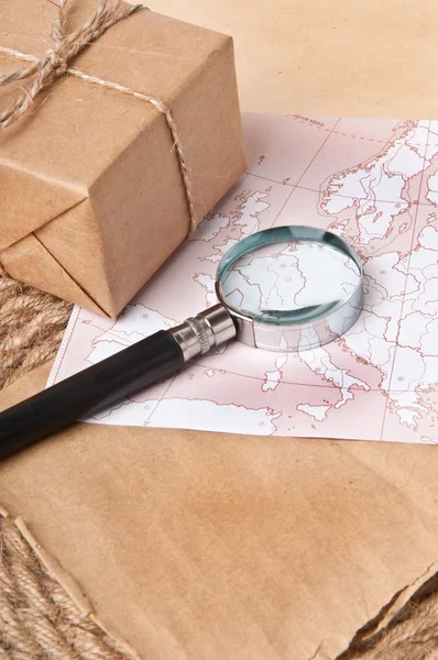 Map and magnifier — Stock Photo, Image