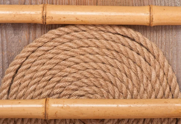 Fondo de cuerda marina, palos de bambú y madera — Foto de Stock