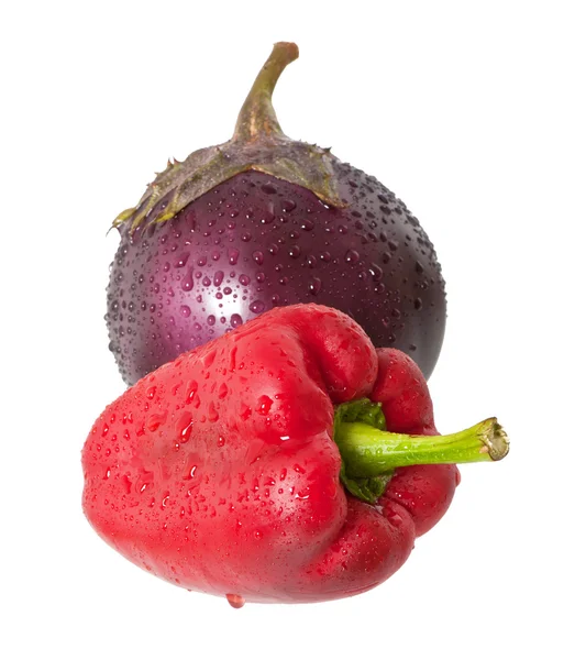 Papriky a lilek na bílém pozadí — Stock fotografie