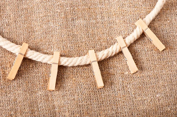 Clothespins on rope — Stock Photo, Image