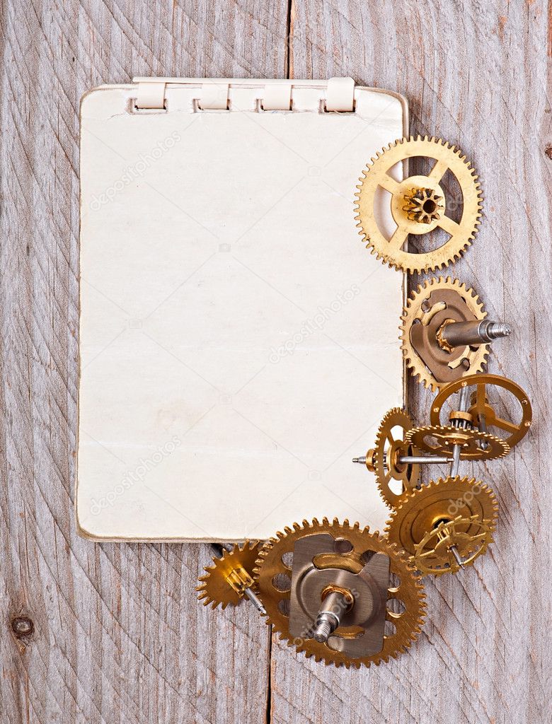 Notebook and gears of the clock