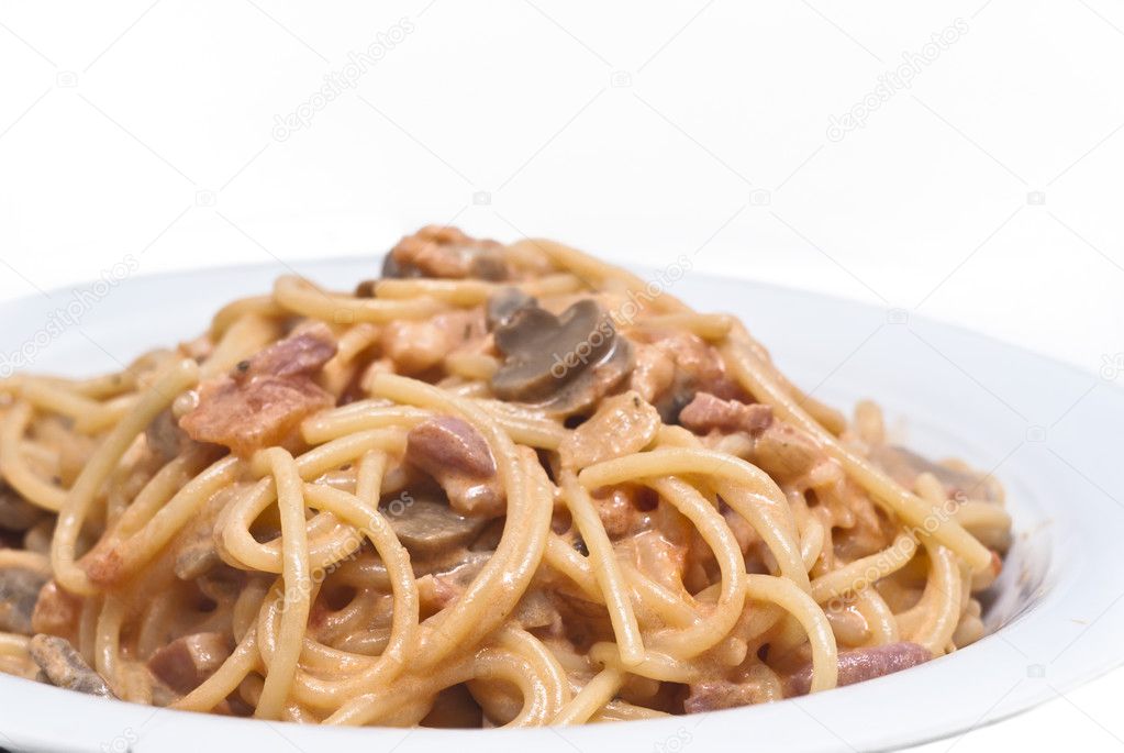 spaghetti pasta with mushrooms sauce isolated