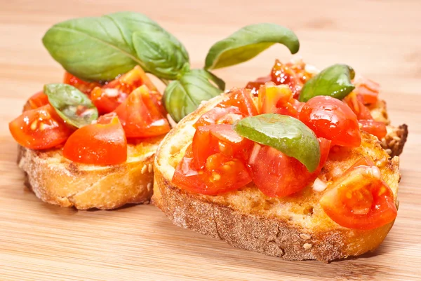 Bruschette, italian appetizer — Stock Photo, Image