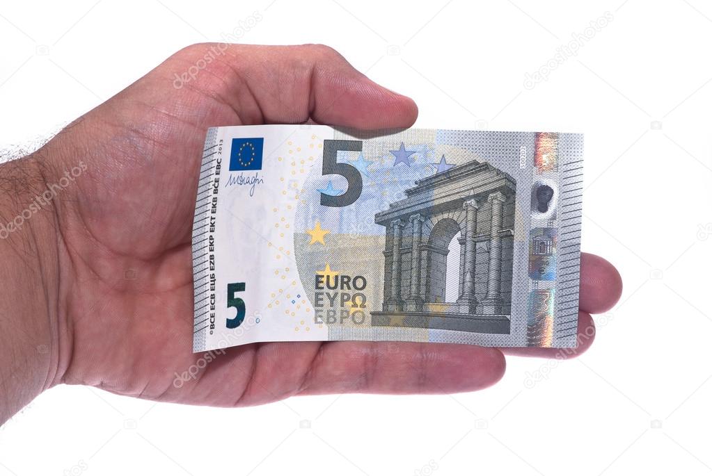 New ticket 5 euros in man hand