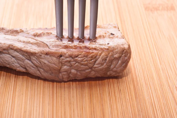 Beef with fork — Stock Photo, Image