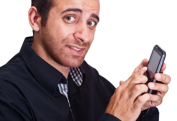 Een knappe zakenman met een smartphone — Stockfoto
