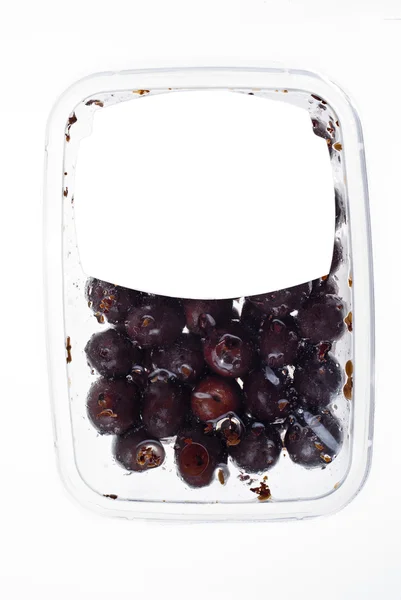 Olives in plastic box surface — Stock Photo, Image