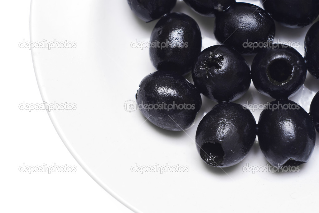 Black pitted olives isolated