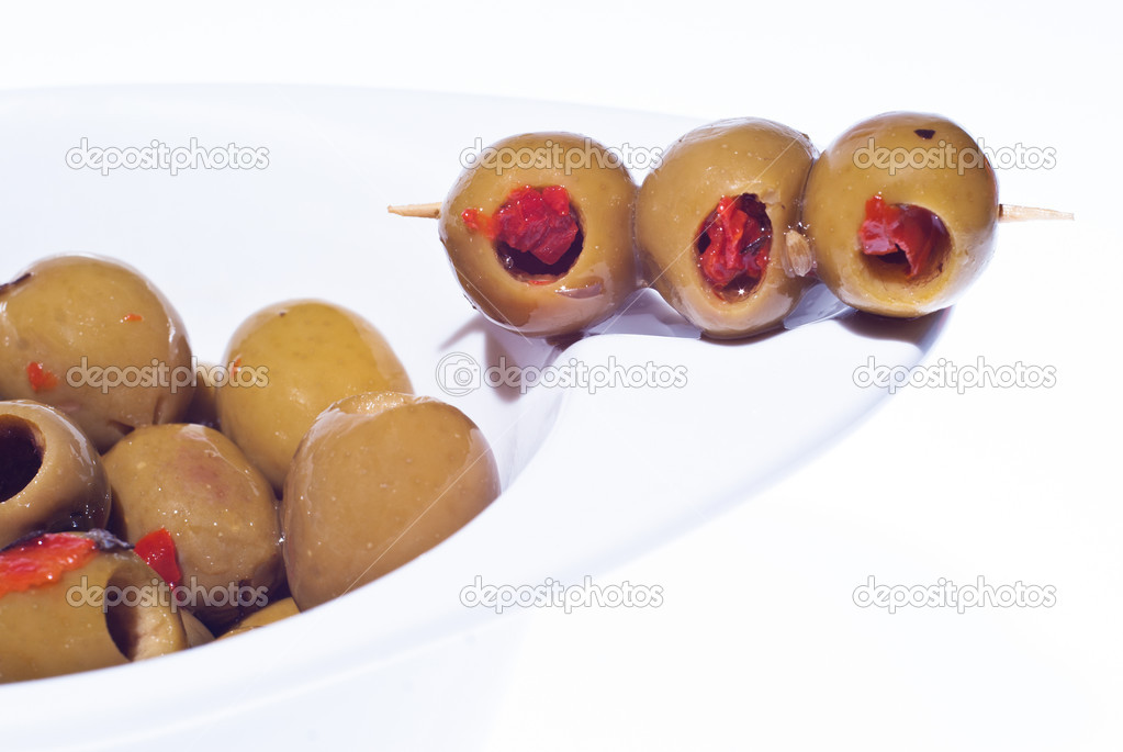 marinated green olives in bowl