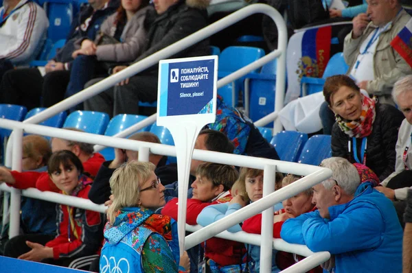 Volunteer at short-trek speed skating XXII Winter Olympic Games — Stock Photo, Image