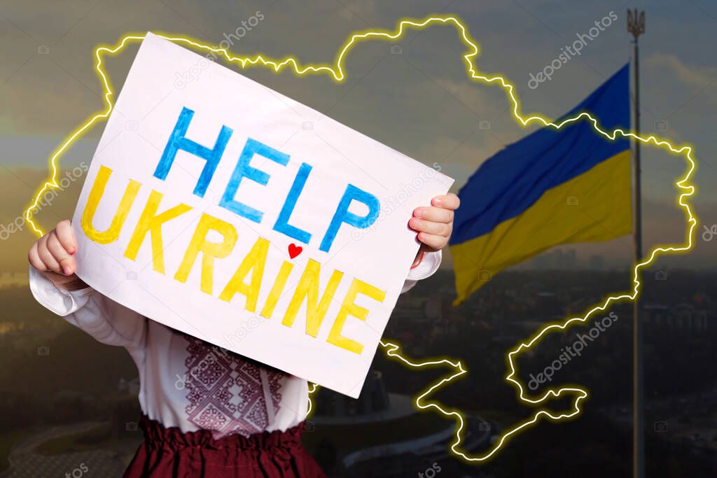 Sad toddler Ukrainian girl kid in embroidery dress protesting war conflict holding banner Help Ukraine. Pray for Ukraine.