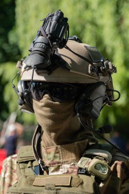 Mannequin in army uniform and equipment. Safety helmet and goggles.