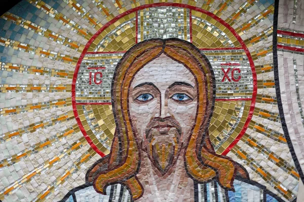 A fragment of the mosaic of the resurrection of Jesus Christ after death for three days. Station XV. Jesus Mosaic Art