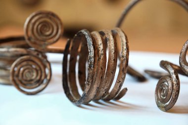 Pair of bronze spiral bracelets from the bronze age. Trzciniec-Komariv culture. Bronze adornments.