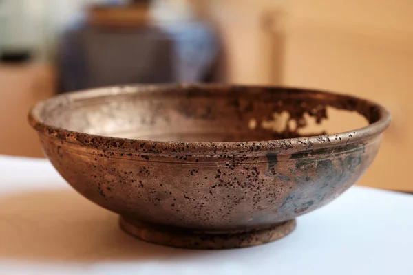 Bronze bowl of Roman Time. Accompanying inventory from burial. Lipitsa culture.