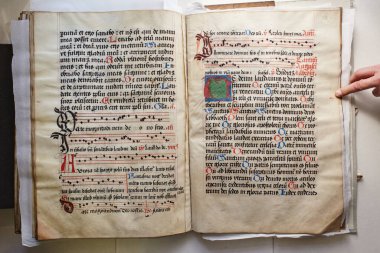 LVIV, UKRAINE - April 4, 2020: manuscripts in the medieval library. Incunabula. Books printing in Europe in the 1450s to the end of the 15th century