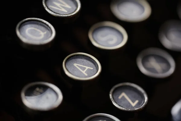 Vintage typewriter keys. Closeup of a vintage typewriter. Shallow depth of field