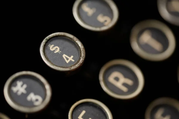 Vintage typewriter keys. Closeup of a vintage typewriter. Shallow depth of field