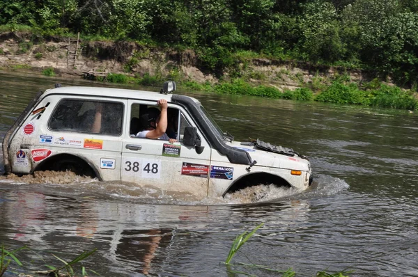 Campeonato ruso de ataque trofeo entre SUV, ATV y motocicletas — Foto de Stock