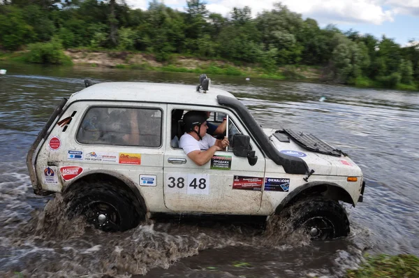 Rusga troféu campeonato russo entre SUVs, ATVs e motocicletas . — Fotografia de Stock