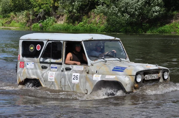 Russian championship trophy raid among SUVs, ATVs and motorcycles. — Stock Photo, Image